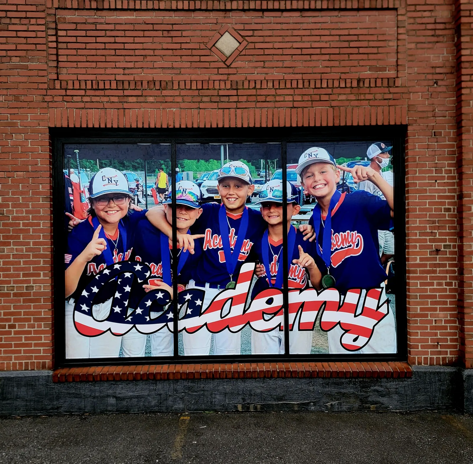 CNY Academy -- large photo window wrap on brick building